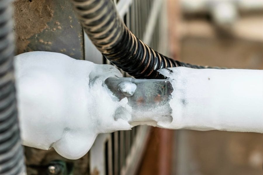 What caused my air conditioner to freeze up?