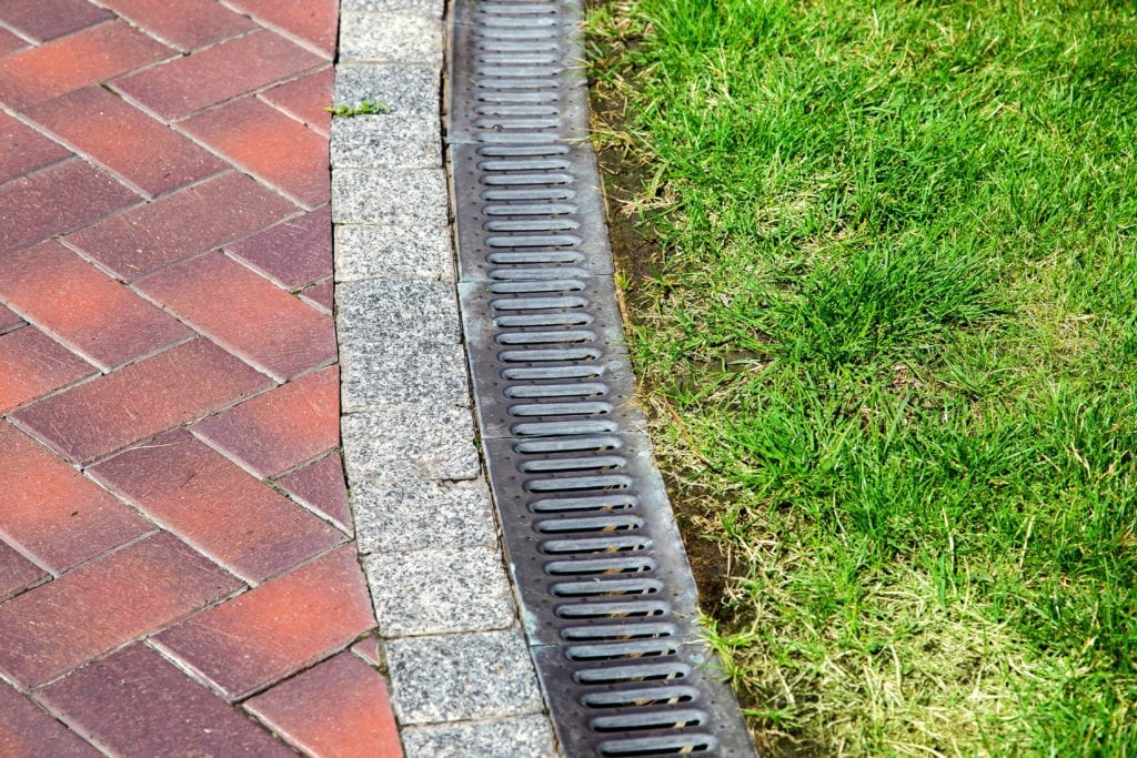 Pavers Are a Great Landscaping Idea to Keep Water Away From House