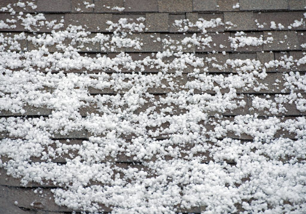 Piles of hail on the roof