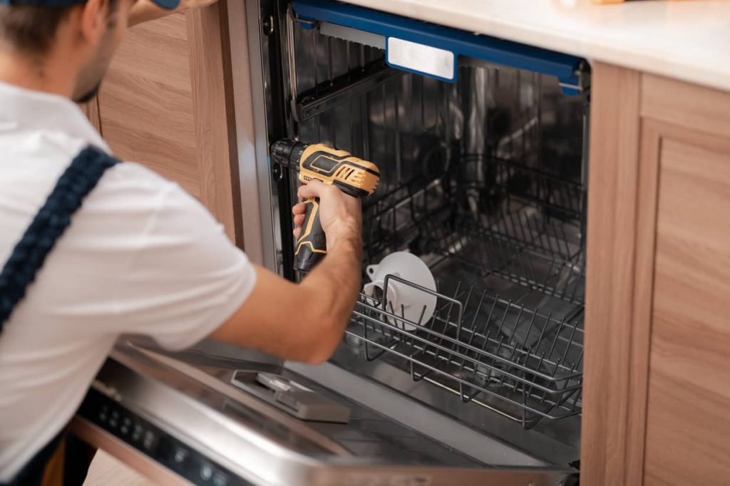 Removing the dishwasher.