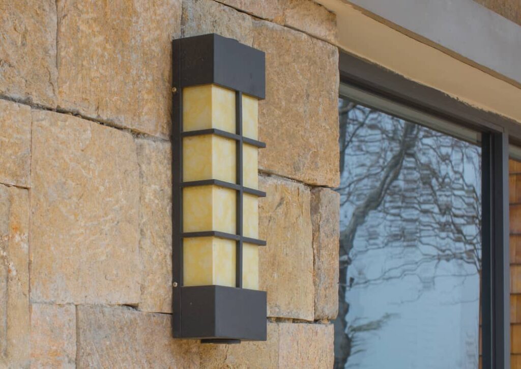 Flat masonry stone is easier to install exterior lighting on.